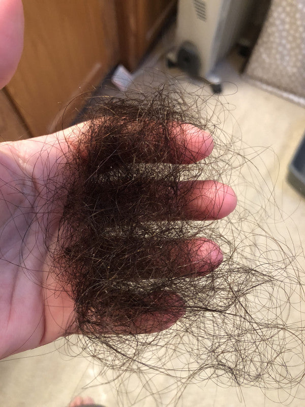 large hair shedding clump after shower
