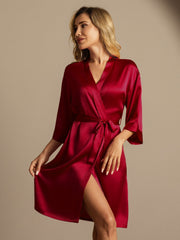 Women's red mulberry silk 3/4 sleeve kimono wrap robe, tied at waist, with a high slit.