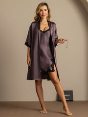 Women's mulberry silk nightgown and robe set in dark purple with black lace trim.