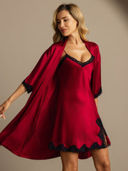 Women's red mulberry silk nightgown and robe set with black lace trim.