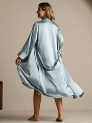 Women's light blue 100% mulberry silk belted long lapel robe with pocket design.