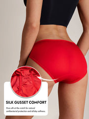 Red 100% Mulberry silk bikini panty with delicate trim, shown on a model from behind.