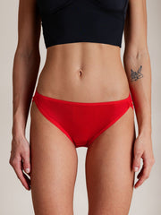 Red mulberry silk bikini panty with bow detail.