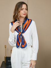 Mulberry silk bohemian square scarf, 86x86cm, with blue, orange, and patterned design on a woman.