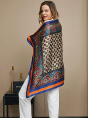 Bohemian mulberry silk square scarf, 86x86cm, with vibrant paisley and geometric patterns, orange and blue border.