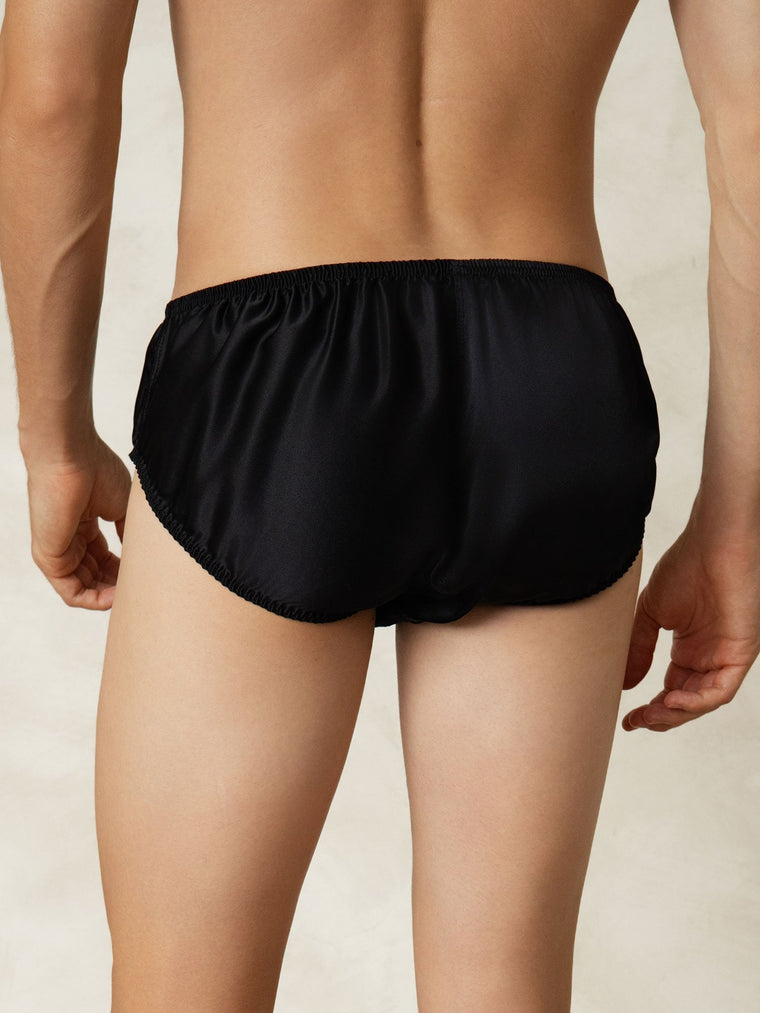 Men's black mulberry silk briefs with elastic waistband.
