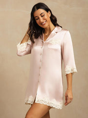 Pink mulberry silk button-up nightshirt with lace trim on sleeves, pocket, and hem.