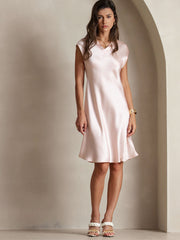 Women's light pink 100% Mulberry silk cap sleeve V-neck knee dress.