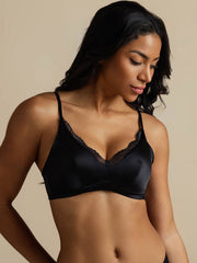 Black mulberry silk wireless bra with lace trim on a woman.