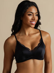 Black 100% Mulberry silk wireless bra with classic lace trim, worn by a woman.