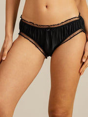 Black mulberry silk comfort ruffle sheer trim panty, shown on a model.