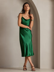 Emerald green mulberry silk cowl neck midi dress on a woman.