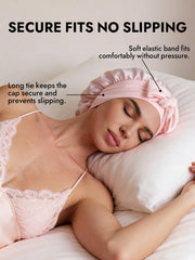 Pink mulberry silk double-layer bonnet with adjustable long tie on a sleeping woman.