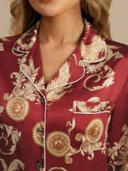 Women's mulberry silk dragon print pajama top in red with white piping and notch collar.