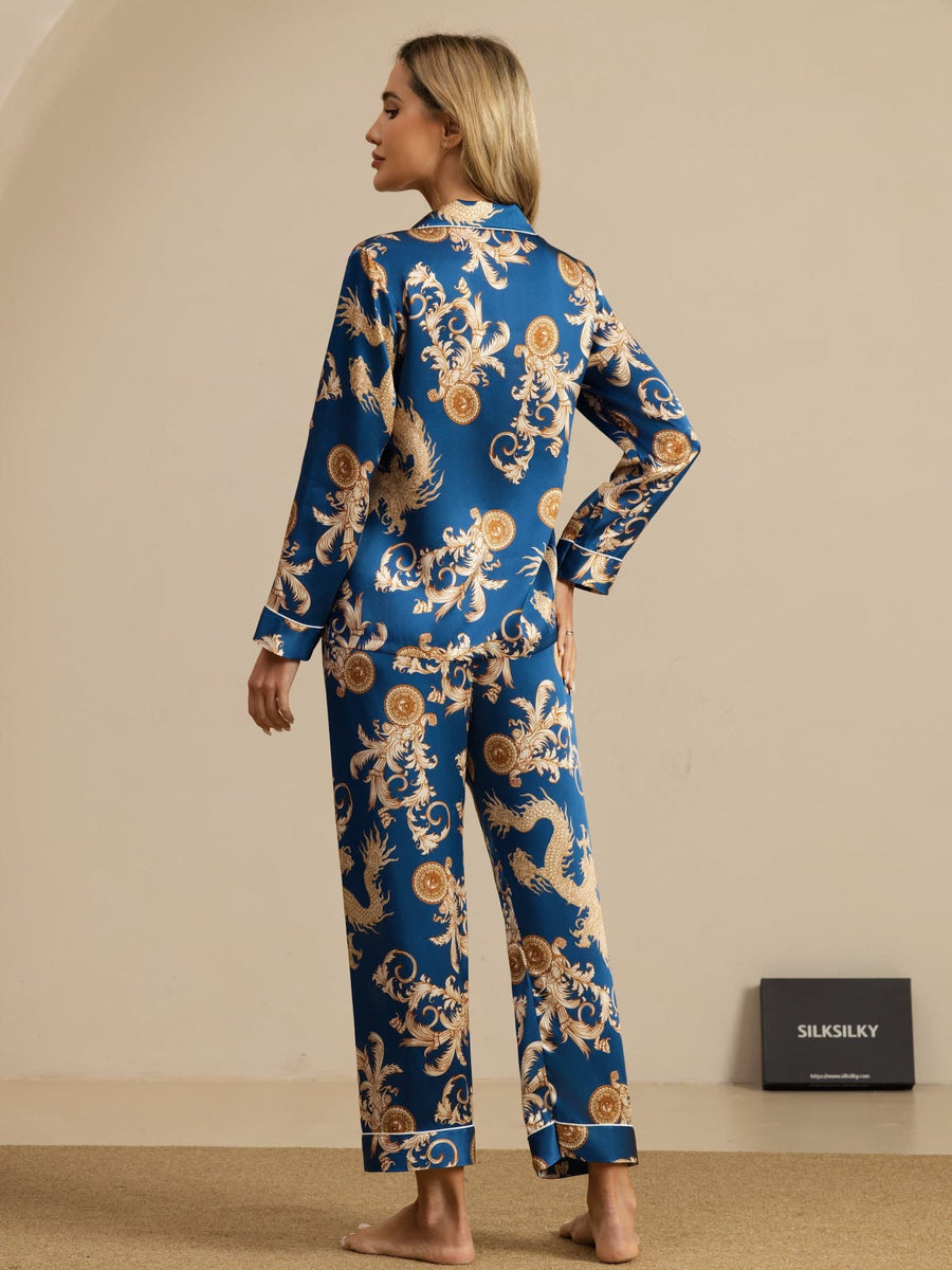 Women's mulberry silk pajamas: blue long-sleeve notch collar set with gold dragon print and white piping.