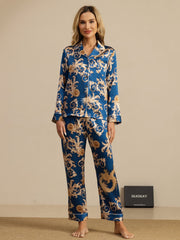 Women's mulberry silk pajamas: blue, long-sleeve, notch collar set with gold dragon print and pants.