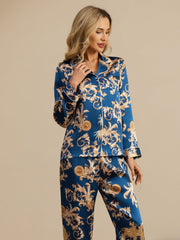 Women's mulberry silk pajamas: blue, long-sleeve, notch collar set with pants and gold baroque print.