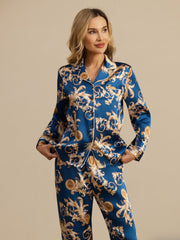 Women's mulberry silk pajamas: blue dragon print long sleeve top with notch collar and matching pants.