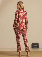 Women's mulberry silk pajamas in red with a gold dragon print, long sleeves, and notch collar.
