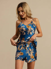 Women's mulberry silk camisole and shorts set in blue with gold dragon print.