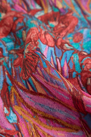 Mulberry silk floral pattern square scarf in vibrant red, blue, and pink hues.