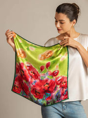 Women's 100% mulberry silk square scarf with vibrant red flower impression on a lime green background.