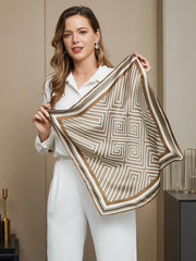 Women's mulberry silk geometric pattern square scarf in brown and white.