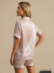 Women's mulberry silk geometric print short sleeve pajama set with notch collar.