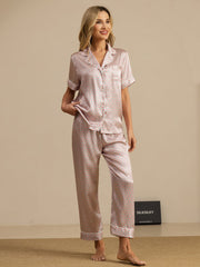 Women's mulberry silk geometric print short sleeve pajama set with notch collar and pants.