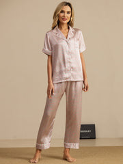 Women's mulberry silk geometric print short sleeve pajama set with notch collar and pants.