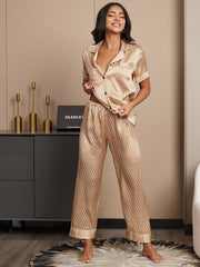 Women's mulberry silk geometric print short sleeve pajama set with notch collar and pants.
