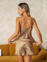 Women's mulberry silk camisole and shorts set with geometric print, spaghetti straps, and V-neck.