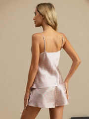 Women's mulberry silk geometric print camisole and shorts set in pink and blue.