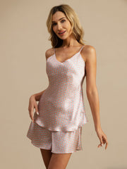 Women's mulberry silk camisole and shorts set with pink and blue geometric print.
