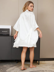 Women's white mulberry silk kimono robe with tie waist, worn by a model.