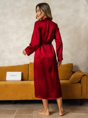 Women's long sleeve midi robe in luxurious red mulberry silk, tied at the waist.