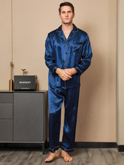Men's navy blue mulberry silk long sleeve pajamas with notch collar and button-up design.
