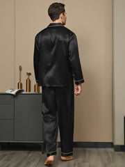Men's black mulberry silk long sleeve pajamas with white piping and notch collar.