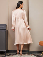 Women's blush pink mulberry silk V-neck midi nightgown with long sleeves and lace cuffs.