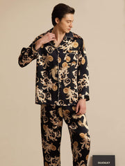 Men's black mulberry silk pajamas with gold dragon print, long sleeve, and notch collar.