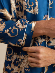 Men's mulberry silk pajamas: blue dragon print, long sleeve, notch collar, white piping.