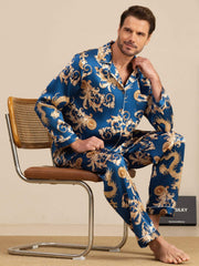 Men's navy mulberry silk pajamas with gold dragon print, long sleeves, and notch collar.