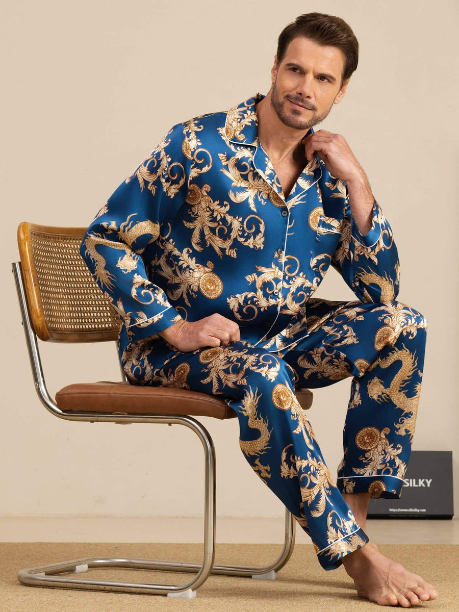 Men's navy mulberry silk pajamas with gold dragon print, long sleeves, and notch collar.