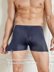 Navy blue mulberry silk men's boxer briefs with front opening, shown on a model, highlighting elastic comfort.