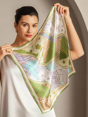 Woman holding a 53x53cm mulberry silk scarf with a colorful pattern stitching design.