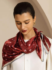 Mulberry silk scarf, 90x90cm, in deep red with white paw prints and "SilkSilky" branding.