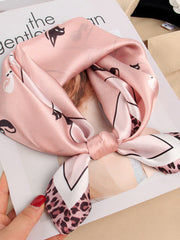 Pink mulberry silk square scarf with black cat and leopard print.