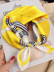 Yellow mulberry silk printed designer square scarf with navy and white chain pattern.