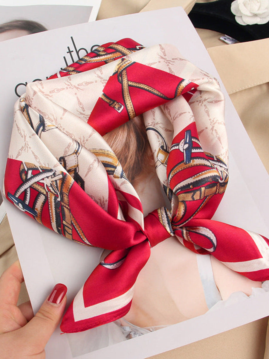 Red and cream mulberry silk square scarf with a designer chain and buckle print.