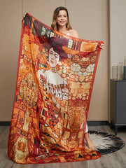 Woman holding a large 100% mulberry silk printed rectangle scarf (175x105cm) with abstract art in warm tones.